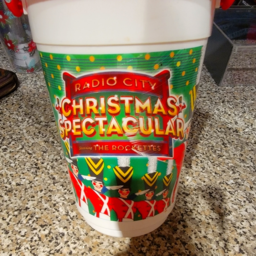 Radio city hall collector bucket , handle lights up